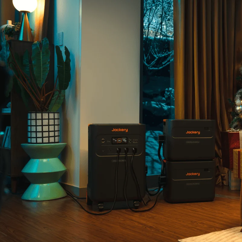 Jackery Battery Pack 5000 Plus – living room stack with Explorer 5000 Plus Jackery Battery Pack 5000 Plus stacked under an Explorer 5000 Plus in a living room (station sold separately)